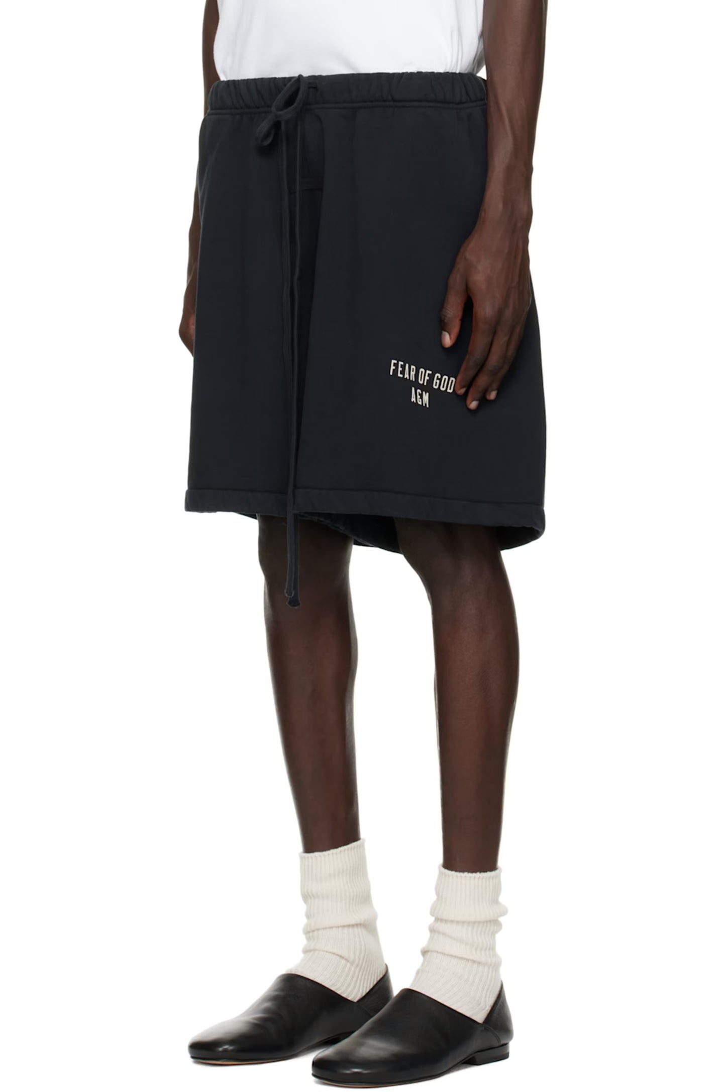 FEAR OF GOD ESSENTIALS Black Heavy Fleece Soccer Shorts Mens
